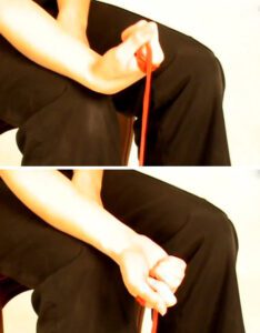 Wrist flexors strengthening with the use of the theraband with supinated hand