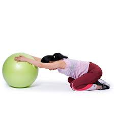 Child’s Pose with an exercise ball